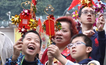 Worshippers visit Che Kung Temple in Sha Tin to pray for good luck and prosperity in the Year of the Dog on the third day of the Lunar New Year. Photo: Felix Wong