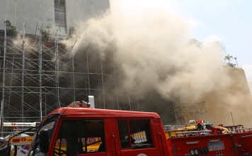More than 20 people injured and two others believed to be trapped inside the building