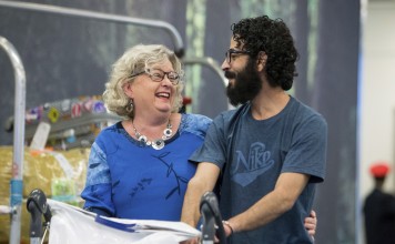 Hassan al-Kontar and a supporter from Canada share a light moment after his arrival in Vancouver. Photo: AP