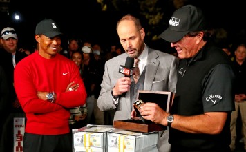 Phil Mickelson reacts with the winner's belt after beating winning The Match: Tiger vs Phil golf match at Shadow Creek Golf Course. Photo: USA Today