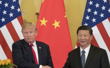 Top Beijing official attacks US over WTO reforms, and says China economy is not as developed as claimed