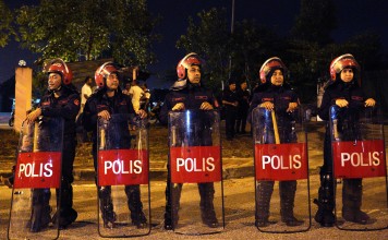 Malaysian police seized 47 pens and 336 notebooks containing Bible verses. Photo: AP