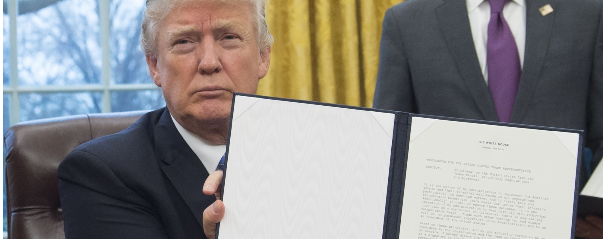 Trump’s order to withdraw from the TPP. Photo: AFP