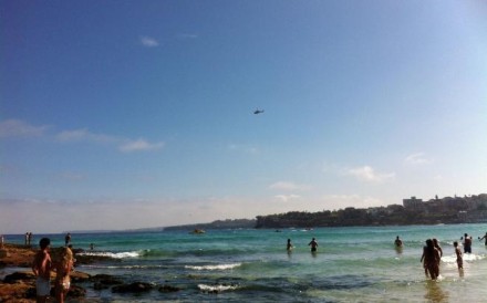 Surfers Could Be Banned From Sydney S Bondi Beach Prompting This Photo Taken On A Smartphone Shows Swimmers At Sydney S Iconic Bondi Beach Standing The