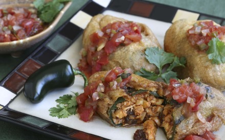 With the recipe for chiles rellenos with chicken picadillo and warm tomato salsa, you can satisfy your craving right at home