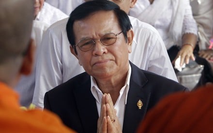 Leader of the Cambodia National Rescue Party Kem Sokha prays during a Buddhist ceremony. Photo: AP
