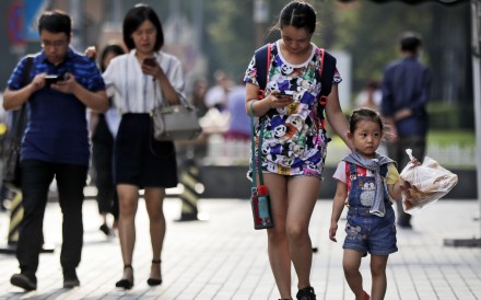 Internet regulators in China ? where 95 per cent of its internet users are on mobile ? have slapped the heaviest fines on WeChat, Weibo and Baidu over banned contents. Photo: AP
