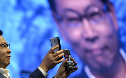 Richard Yu, chief executive of Huawei’s consumer business group, presents the new Huawei Mate 10 and Mate 10 Pro phones at the official launch event in Munich, southern Germany, on Monday. Photo: EPA