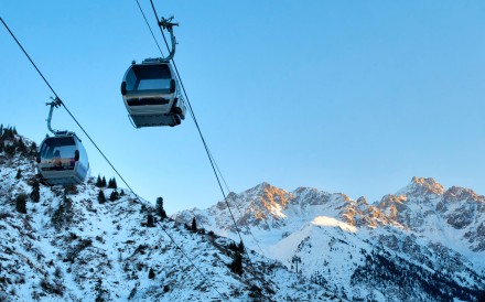 Cable cars going to and from the Shymbulak Ski Resort, one of the best places to ski in Kazakhstan. Photo: Alamy