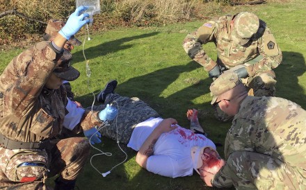 Medics from the US Army and China's People's Liberation Army team up to practise first aid at Camp Rilea Armed Forces Training Centre near Warrenton in Oregon. Photo: AP