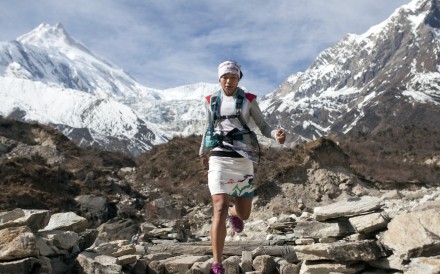 Nepalese runner Mira Rai runs in the mountains in Nepal.