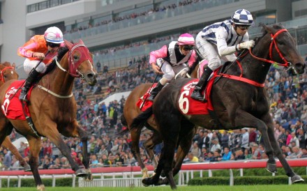 Joao Moreira pushes out Seasons Bloom to take out the Group Two Jockey Club Mile in November. Photos: Kenneth Chan