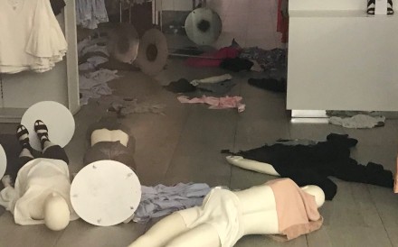 A vandalised H&M store is seen in Sandton, South Africa, on Saturday. The company shut a number of its stores in the country following protests and vandalism during outrage over an advertisement showing a young black boy wearing a hoodie that reads “coolest monkey in the jungle”. The sentiment was decried as racist, and H&M apologised. Photo: Twitter via REUTERS