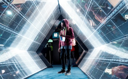 Jordan Jtakin walks though a “5G simulator” in the Intel booth during the 2018 CES technology show in Las Vegas, Nevada, on January 9. Photo: Reuters