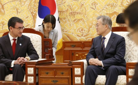Japanese Foreign Minister Taro Kono talks with South Korean President Moon Jae-in. Photo: AP Japanese Foreign Minister Taro Kono talks with South Korean President Moon Jae-in. Photo: AP