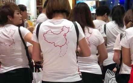 A photo of Chinese tourists wearing T-shirts depicting Beijing’s claims to the disputed South China Sea has sparked online anger in Vietnam. Photo: Twitter