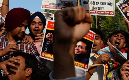 A protest against billionaire jeweller Nirav Modi and India’s Finance Minister Arun Jaitley in the wake of the Punjab National Bank banking fraud scandal in New Delhi. Photo: AFP