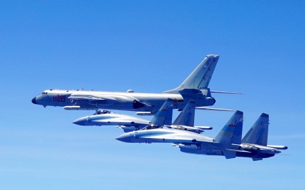 Two Su-35 fighter jets and an H-6K bomber fly in formation last May as the PLA Air Force conducted patrol training over Taiwan. Photo: Xinhua