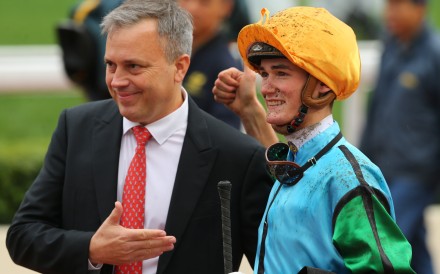 Jockey Regan Bayliss celebrates with trainer Caspar Fownes after his first Hong Kong winner. Photos: Kenneth Chan