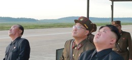 North Korean leader Kim Jong-un (right) pictured watching the launch of a Hwasong-12 missile in a photograph released by North Korean state media earlier this month. Photo: Reuters