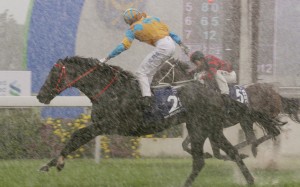 Mr Medici (Gerald Mosse) wins the Champions & Chater Cup in 2010, the last meeting which saw racing on a slow track. Photo: Kenneth Chan