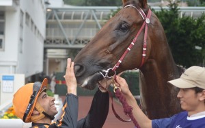 Joao Moreira gives Able Friend a pat after the pair combined to win the Queen's Silver Jubilee Cup. Photo: Andrew Hawkins