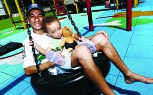 Joao Moreira relaxes with his daughter, Marina, at home in Sha Tin. Photo: Jonathan Wong