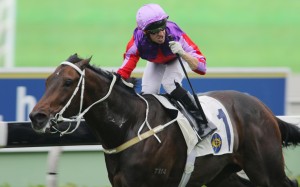 Neil Callan celebrates after making it a double on Tony Cruz's Doyeni. He had won a race before on Romantic Touch. Photo: Kenneth Chan