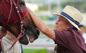 John Moore gives Rapper Dragon a pat after his win in the Lion Rock Trophy on Sunday. Rapper Dragon will spearhead Moore’s Derby team next season. Photo: Kenneth Chan