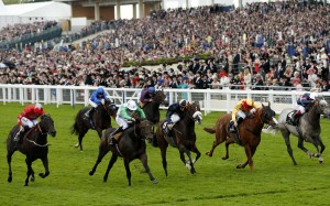 Twilight Son (green and white) bursts through to just hold off Gold-Fun (gold and red) in the Diamond Jubilee Stakes, with Signs Of Blessing splitting them in third. Photo: Reuters