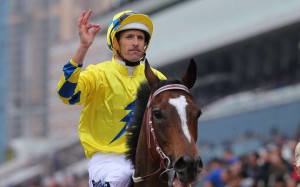 Hugh Bowman celebrates Werther’s victory in the Group One Citi Hong Kong Gold Cup after winning on Winx a day earlier. Photo: Kenneth Chan