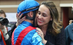 An overwhelmed Joao Moreira gets a big hug from wife Taciana after winning the BMW Derby aboard Rapper Dragon. Photos: Kenneth Chan