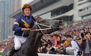 Tommy Berry and Chautauqua return to scale after winning the 2016 Chairman’s Sprint Prize at Sha Tin. Photo: Kenneth Chan