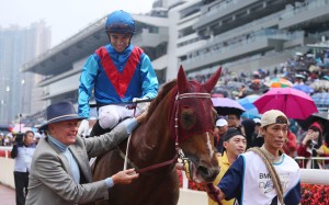 John Moore walks Rapper Dragon and Joao Moreira back after winning the BMW Hong Kong Derby. Photos: Kenneth Chan