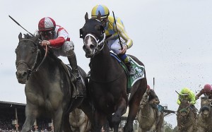 Jockey Javier Castellano riding Cloud Computing (left) just beats Classic Empire, ridden by Julien Leparoux, to a first-place finish in the 142nd running of the Preakness Stakes at Pimlico on Saturday. Photo: Washington Post