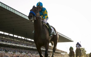 American Pharoah wins the 2015 Belmont Stakes to complete the Triple Crown. Photo: REUTERS/Lucas Jackson