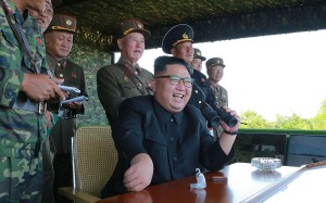 North Korean leader Kim Jong-un presides over a target strike exercise. Photo: AFP