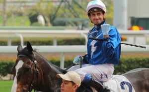 Douglas Whyte celebrates his win aboard Iron Boy on Saturday. Photos: Kenneth Chan