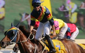 A jubilant Neil Callan salutes on California Whip. Photos: Kenneth Chan