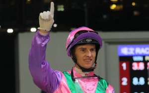 Zac Purton celebrates one of his four winners at Happy Valley on Wednesday night. Photos: Kenneth Chan