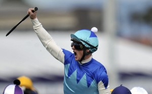 Zac Purton celebrates winning the 2014 Caulfield Cup on Japanese horse Admire Rakti. Photos: EPA