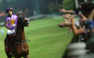 Grant van Niekerk returns to scale after winning with Little Bird on Wednesday night. Photos: Kenneth Chan