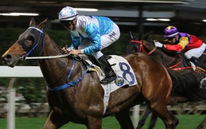 Smart Baby salutes under Zac Purton at Happy Valley on Wednesday night. Photos: Kenneth Chan