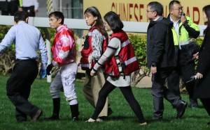 Alexis Badel walks back to scale after falling from Simply Brilliant. Photos: Kenneth Chan