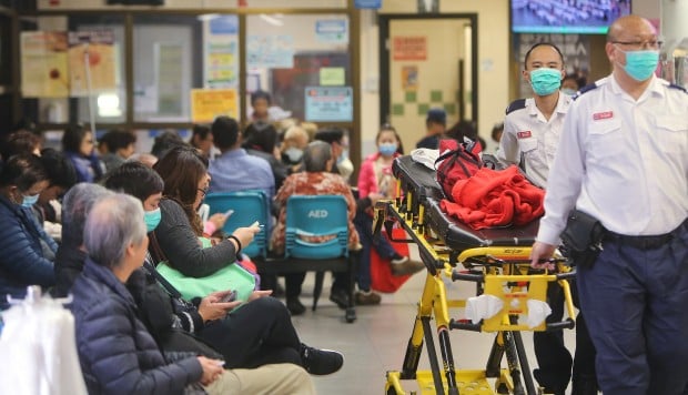 Eight-hour waits in emergency rooms as Hong Kong hospitals feel flu season surge over Christmas holidays