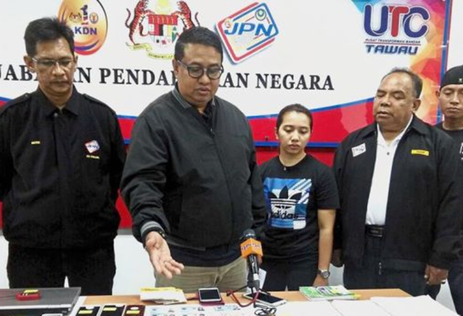 Masterminds nabbed over fake Malaysian identity card sales  South 