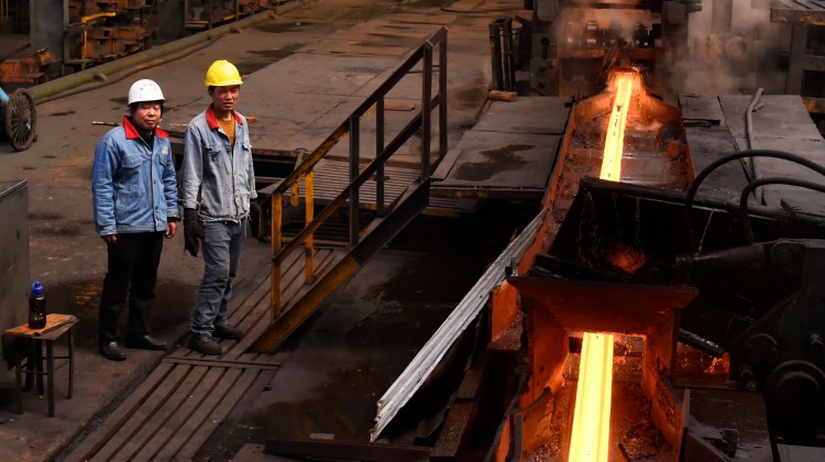 A file picture of workers at a steel plant in China's Shandong province. Photo: Agence France-Presse