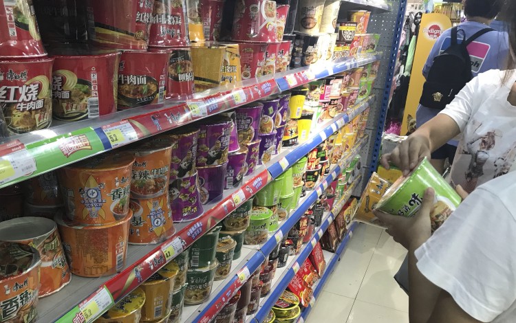 Instant noodles were a popular choice as people in Zhuhai stockpiled food on Saturday in preparation for the arrival of Super Typhoon Mangkhut. Photo: Phoebe Zhang