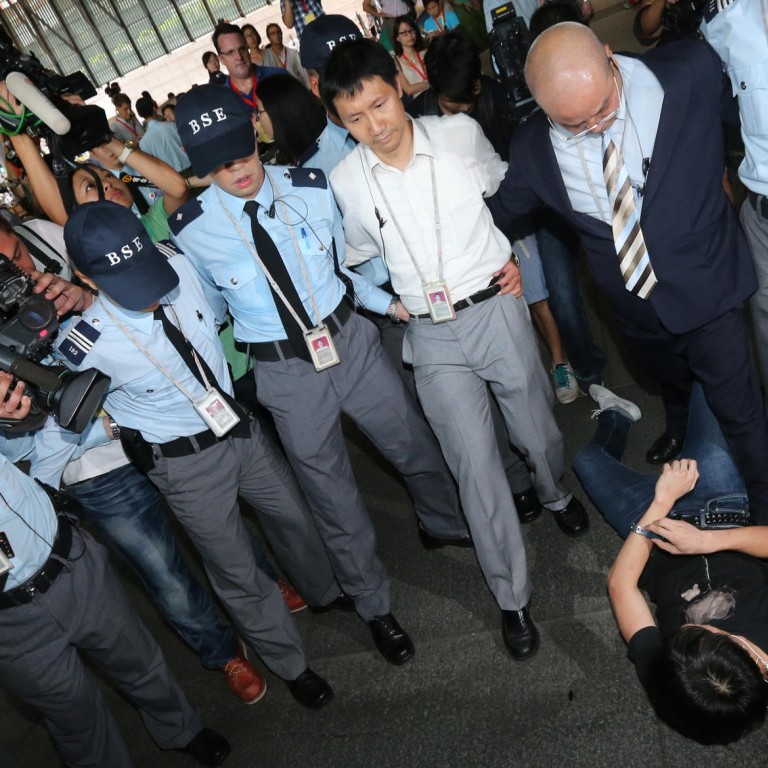 Armed with court order, bailiffs sweep Occupy activists from HSBC site