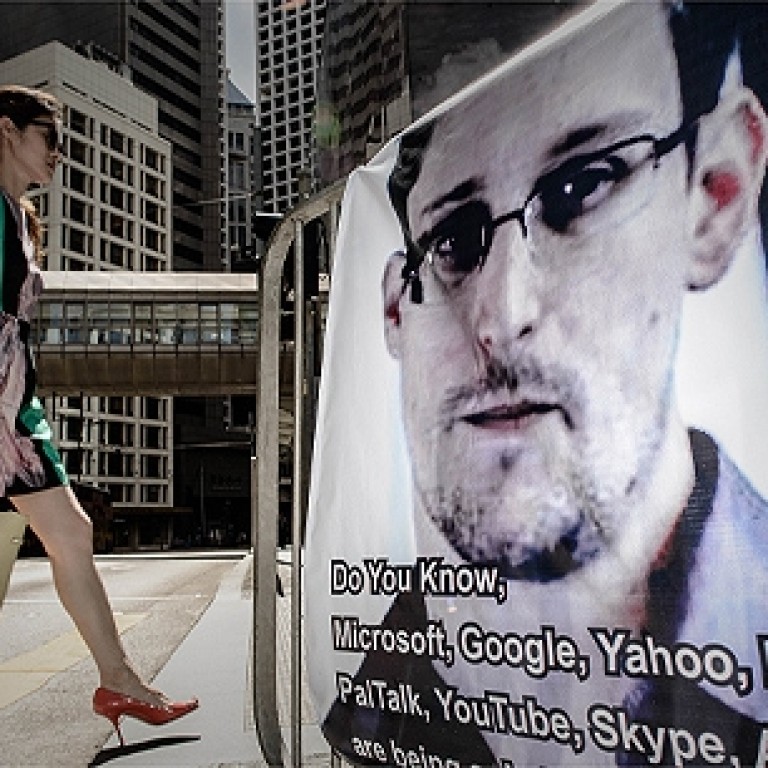 A banner displayed in support of Edward Snowden in Central. Photo: AFP
